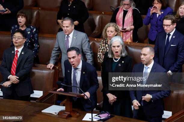 House Democratic leaders Rep.-elect Pete Aguilar , Rep.-elect Katherine Clark and Leader Hakeem Jeffries shout 'Nay!' with their fellow Democrats...