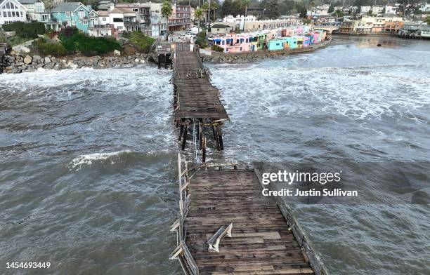 In an aerial view, damage is visible on the Capitola Wharf following a powerful winter storm on January 06, 2023 in Capitola, California. A powerful...