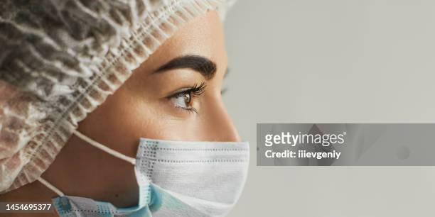 nurse in mask on white background. doctor - medical student stock pictures, royalty-free photos & images