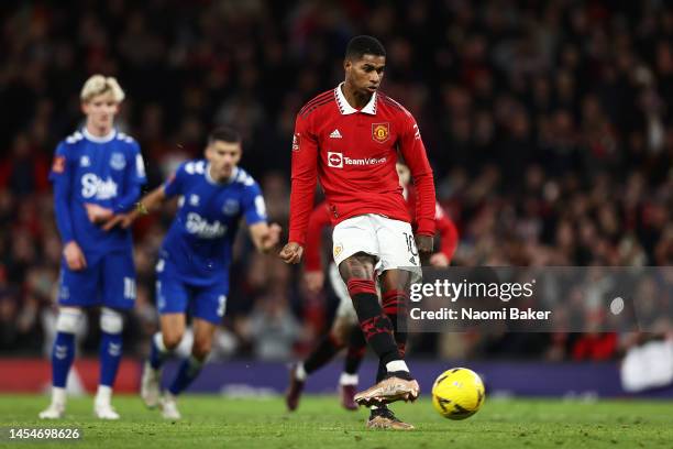 Marcus Rashford of Manchester United scores the team's third goal from a penalty during the Emirates FA Cup Third Round match between Manchester...