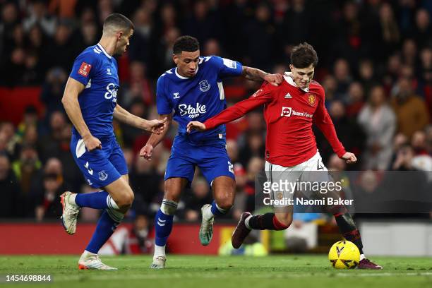 Ben Godfrey of Everton fouls Alejandro Garnacho of Manchester United leading to a penalty awarded to Manchester United during the Emirates FA Cup...