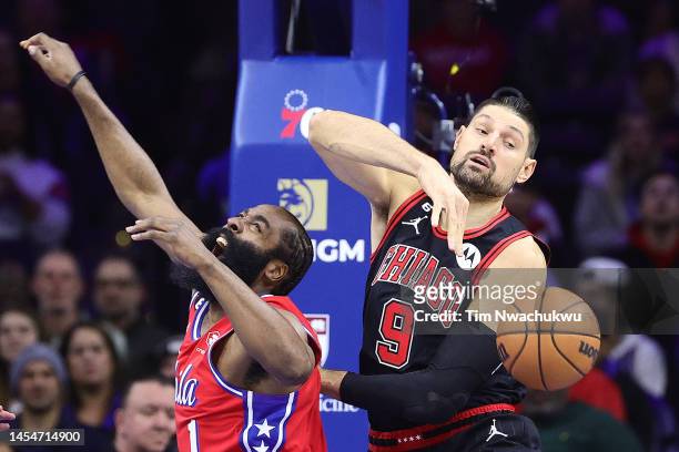 Nikola Vucevic of the Chicago Bulls blocks James Harden of the Philadelphia 76ers during the first quarter at Wells Fargo Center on January 06, 2023...