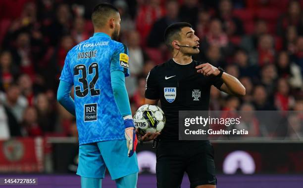 Referee Vitor Ferreira talks with Kosuke Nakamura of Portimonense SC during the Liga Portugal Bwin match between SL Benfica and Portimonense SC at...