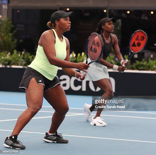 Taylor Townsend of the USA and Asia Muhammad of the USA competes against Storm Hunter of Australia and Katerina Siniakova of Czechoslovakia during...