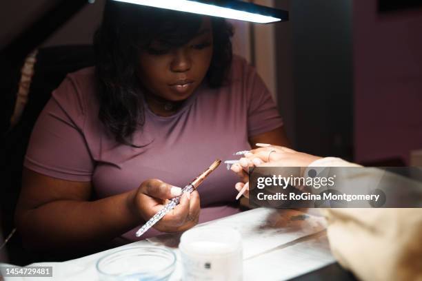 african american nail salon - afroamerikansk kultur bildbanksfoton och bilder