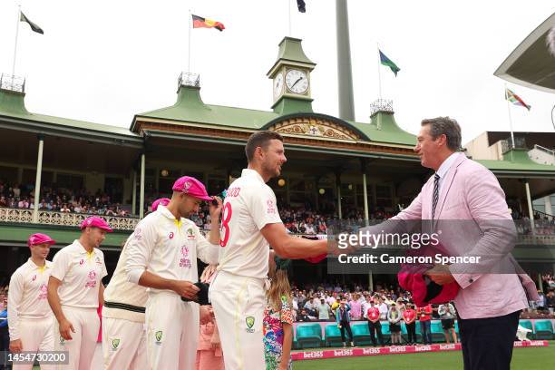 Josh Hazlewood of Australia shakes hands with Glenn McGrath during day four of the Third Test match in the series between Australia and South Africa...