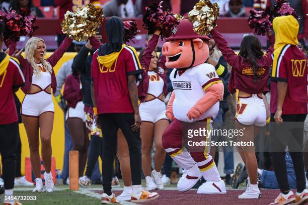 The Washington Commanders introduce the new team mascot Major Teddy after the first half of the game between the Washington Commanders and the...