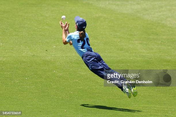 Erin Burns of the NSW Breakers catches out Sophie Reid of Victoria during the WNCL match between Victoria and New South Wales at CitiPower Centre on...