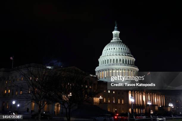 The U.S. Capitol Building is seen at night as the House of Representatives continues to work to elect a New Speaker for the 118th Congress on January...