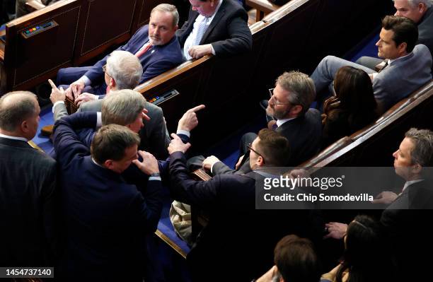 Rep.-elect Mike Rogers is restrained after getting into an argument with Rep.-elect Matt Gaetz in the House Chamber during the fourth day of voting...