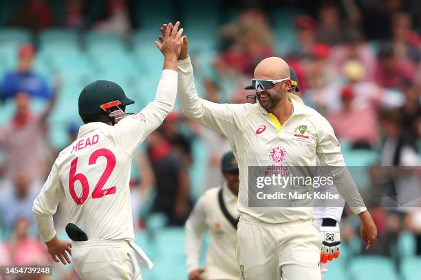 Nathan Lyon of Australia celebrates dismissing Sarel Erwee of South Africa during day four of the Third Test match in the series between Australia...