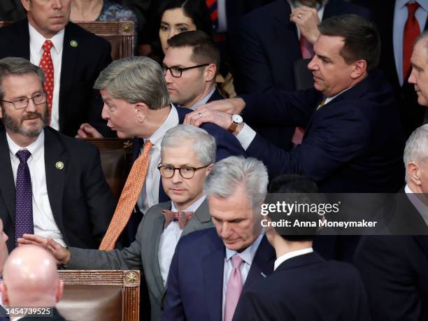Rep.-elect Mike Rogers is restrained by Rep.-elect Richard Hudson after getting into an argument with Rep.-elect Matt Gaetz in the House Chamber...