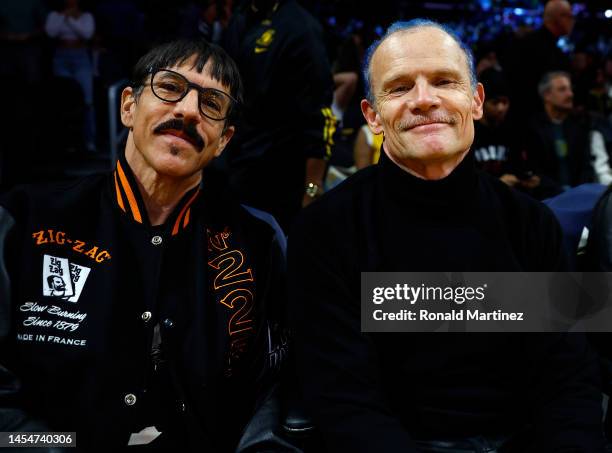 Anthony Kiedis and Flea of the Red Hot Chili Peppers attend a game between the Atlanta Hawks and the Los Angeles Lakers in the first half at...