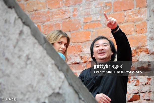 Japanese architect Shigeru Ban and Daria Zhukova, girlfriend of Russian billionaire and Chelsea Football Club owner Roman Abramovich attend on a...
