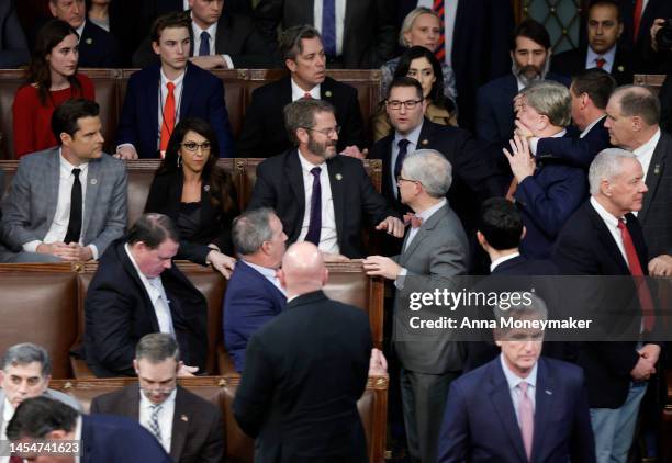 Rep.-elect Mike Rogers is restrained by Rep.-elect Richard Hudson after getting into an argument with Rep.-elect Matt Gaetz as House Republican...