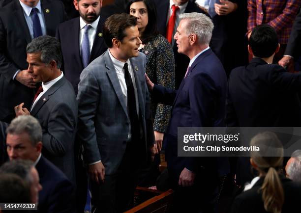 House Republican Leader Kevin McCarthy talks to Rep.-elect Matt Gaetz in the House Chamber during the fourth day of elections for Speaker of the...