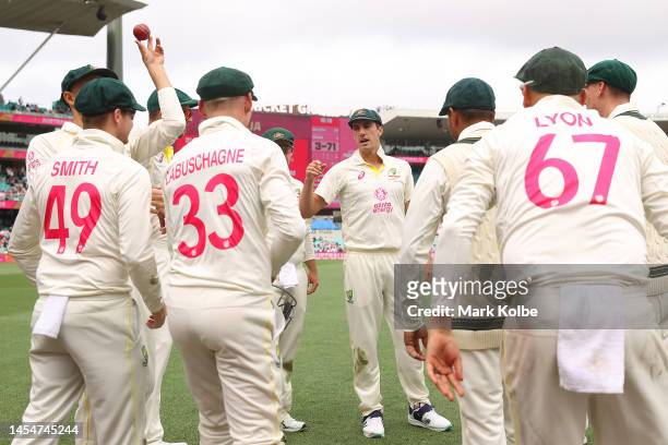 Australia take to the field during day four of the Third Test match in the series between Australia and South Africa at Sydney Cricket Ground on...