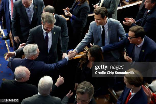 Rep-elect Tim Burchett , Rep.-elect Matt Gaetz and Rep.-elect George Santon congratulate House Republican Leader Kevin McCarthy after he is elected...