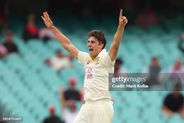 Pat Cummins of Australia celebrates getting the wicket of Khaya Zondo of South Africa during day four of the Third Test match in the series between...