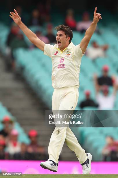 Pat Cummins of Australia celebrates getting the wicket of Khaya Zondo of South Africa during day four of the Third Test match in the series between...