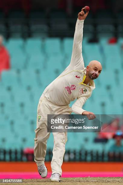 Nathan Lyon of Australia bowls during day four of the Third Test match in the series between Australia and South Africa at Sydney Cricket Ground on...