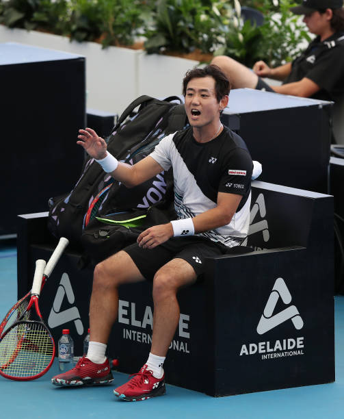 Yoshihito Nishioka of Japan reacts as he competes against Sebastian Korda of the USA during day seven of the 2023 Adelaide International at Memorial...