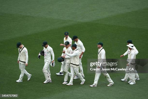Australia leave the field at stumps during day four of the Second Test match in the series between Australia and South Africa at Sydney Cricket...