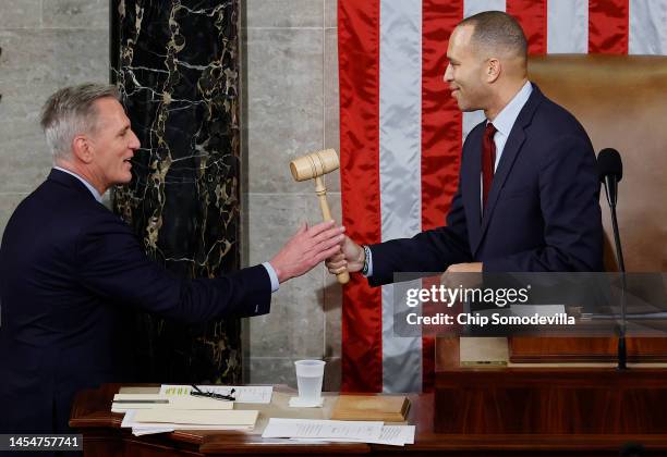 Speaker of the House Kevin McCarthy receives the gavel from House Democratic Leader Hakeem Jeffries after McCarthy was elected Speaker in the House...