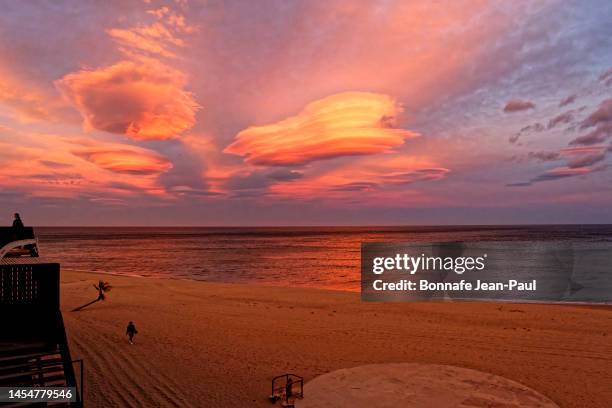 extraordinary sunset with lenticular clouds - aude stock pictures, royalty-free photos & images