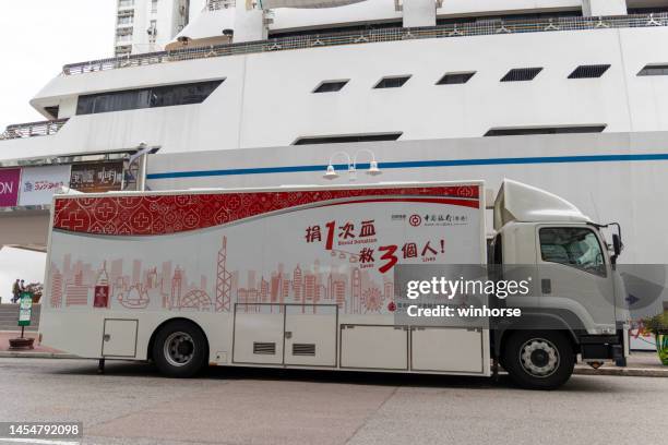 mobile blood donation vehicle in hong kong - blood donation truck stock pictures, royalty-free photos & images