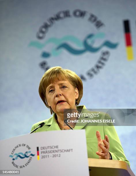 German chancellor Angela Merkel speaks during a press conference at the end of a Baltic Sea States Council summit to discuss energy and demographic...