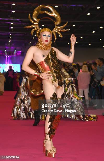 Drag queens walk the runway at a fashion show during the official opening ceremony of RuPaul's DragCon UK 2023 at ExCel London on January 06, 2023 in...