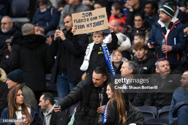 Fan holds up a sign for Son Heung-Min of Tottenham Hotspur prior to the Emirates FA Cup Third Round match between Tottenham Hotspur and Portsmouth FC...