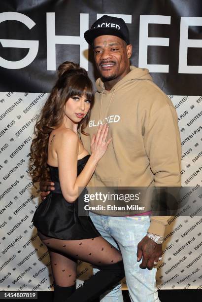 Adult film actress Riley Reid and adult film actor Jason Luv pose at the Vixen pop-up event, an activation alongside the 2023 AVN Adult Entertainment...