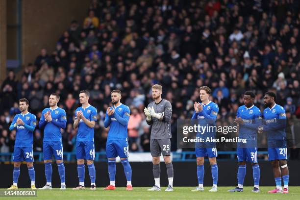 Players, officials and fans hold a minutes applause in memory of former Brazil player Pele, Gianluca Vialli and David Gold, Chairman of West Ham...