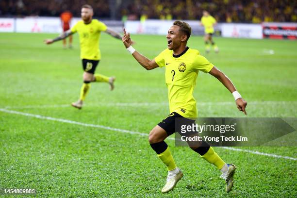 Faisal Halim of Malaysia celebrates after scoring the team's first goal against Thailand in the first half during the AFF Mitsubishi Electric Cup...