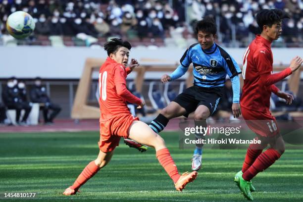 Haruto Okamato of Okayama Gakugeikan scores his team's third goal during the 101st All Japan High School Soccer Tournament semi final between...