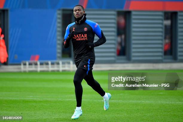 Nuno Mendes warms up during a Paris Saint-Germain training session at PSG training center on January 07, 2023 in Paris, France.