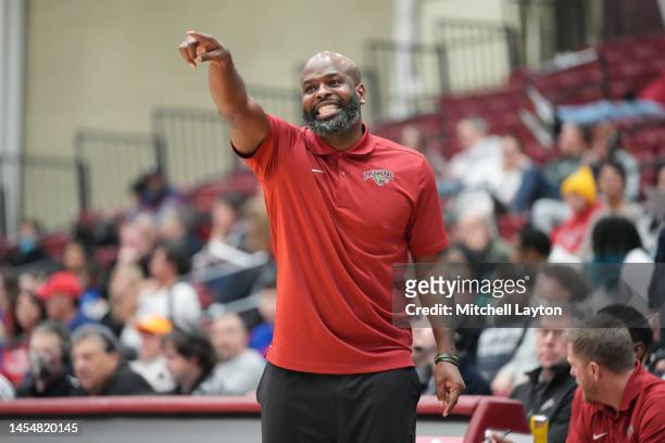 Head coach Mike Jordan of the Lafayette Leopards signals to his players during a college basketball game against the American University Eagles at...