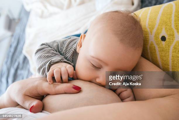 breastfeeding, the most beautiful connection in the world. - dia bildbanksfoton och bilder