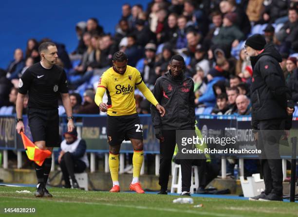 Leandro Bacuna of Watford goes off injured during the Emirates FA Cup Third Round match at the Select Car Leasing Stadium on January 07, 2023 in...