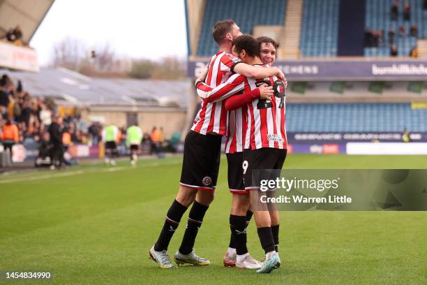 Jayden Bogle of Sheffield United celebrates with team mates after scoring their sides second goal during the Emirates FA Cup Third Round match...