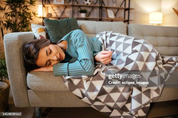 women fall asleep while watching tv - cinema seats stock pictures, royalty-free photos & images