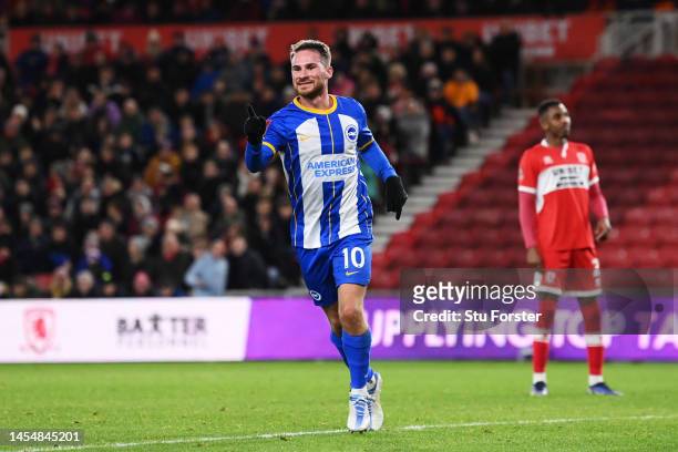 Alexis Mac Allister of Brighton & Hove Albion celebrates after scoring the team's fourth goal during the Emirates FA Cup Third Round match between...