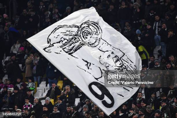 Flag is waved in the stand in memory of Gianluca Vialli prior to the Serie A match between Juventus and Udinese Calcio at Allianz Stadium on January...