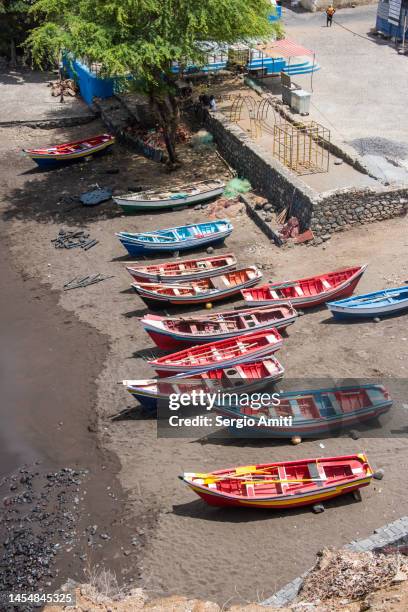 fishing boats on fishermen bay beach at cidade velha on santiago island, cape verde. - cidade velha stock-fotos und bilder