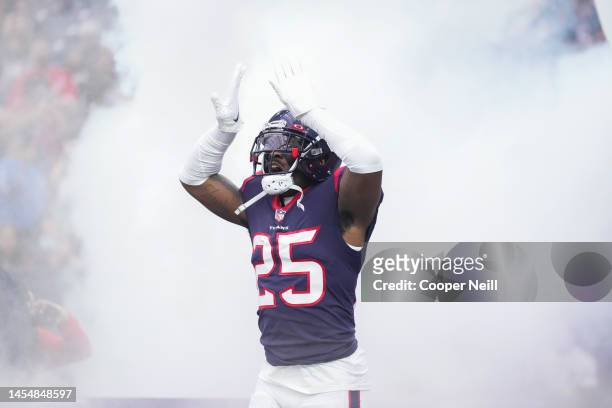 Desmond King II of the Houston Texans runs onto the field during introductions against the Jacksonville Jaguars at NRG Stadium on January 1, 2023 in...