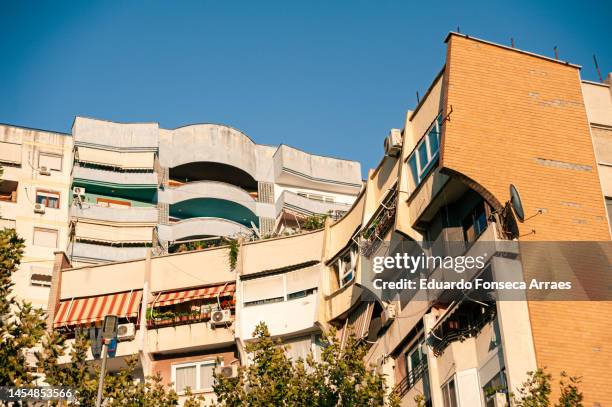 low angle view of communist era residential buildings and apartments - home golden hour stock pictures, royalty-free photos & images