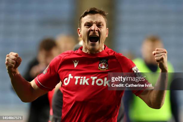 Paul Mullin of Wrexham celebrates the victory after the Emirates FA Cup Third Round match between Coventry City and Wrexham at The Coventry Building...