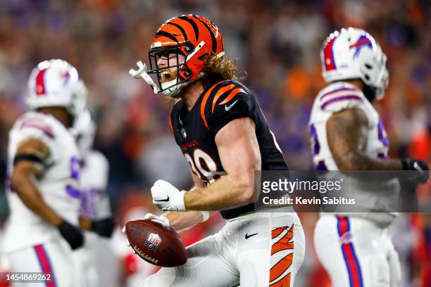 Hayden Hurst of the Cincinnati Bengals celebrates after a play during an NFL football game against the Buffalo Bills at Paycor Stadium on January 2,...